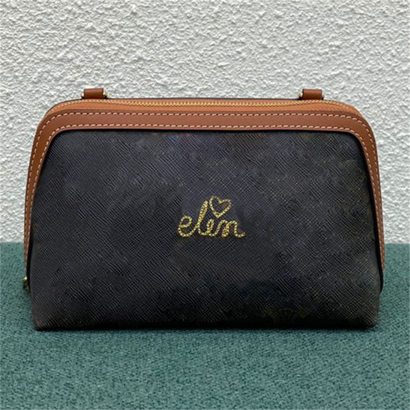 Pochette avec chaîne en toile Triomphe et garnitures en cuir Sac à bandoulière Sacs à bandoulière Doublure textile de créateur Sac à main Fourre-