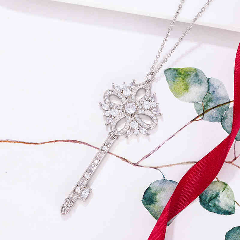 

Designer vs Original designer T home key necklace S925 Sterling Silver Gold Diamond snowflake pendant simple light luxury sweater chain