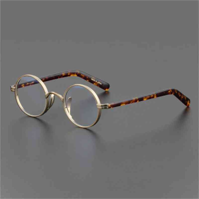 

collection of John Lennon's same small round frame of China style glasses