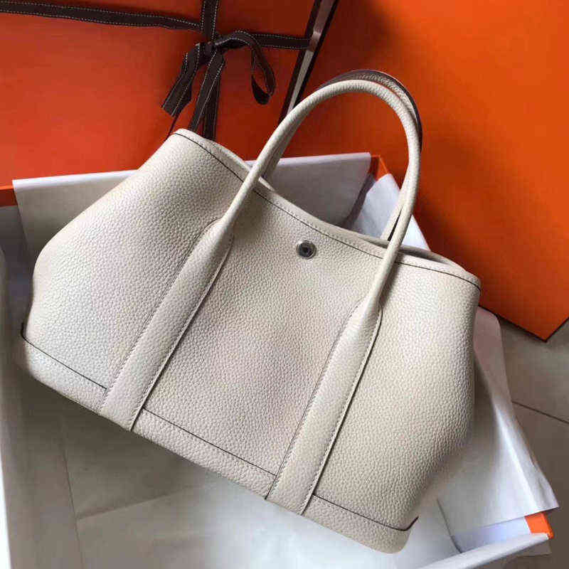 

Designer Herme Handbags New garden party leather tote leisure simple Togo cow large capacity hand, Milkshake white (30cm)