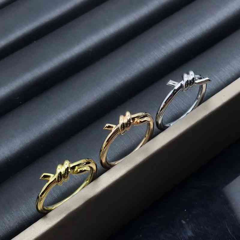 

Fashion t home knot winding ring female diamond pair crossing 18K Valley ailing same style