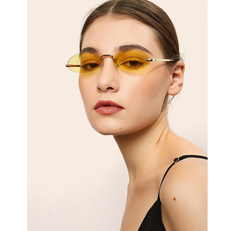

Sunglasses Fashion Retro Small Oval Rimless Dark Women Men UV400 GlassesSunglasses