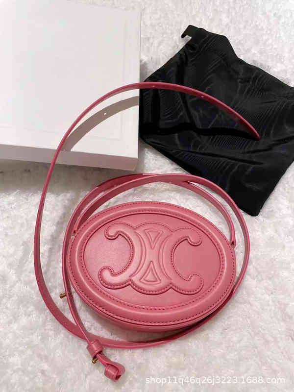 

Direct Sales of New Luxury Brand Bags Wholesale Pig Nose Mini Small Round Cake Leather Messenger Mobile Waist Female Moon, Pink