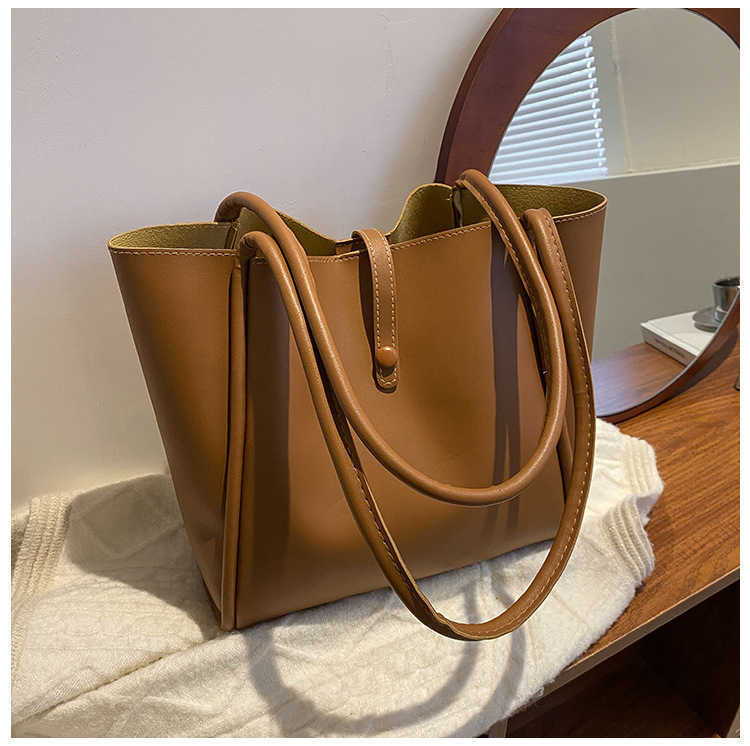 

showecomfort01 store 2022 Korean new solid color bag simple portable tote bag large capacity Spring Fashion Shoulder Bag, Black