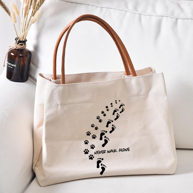 

Shopping Bags Never Walk Alone Paws Printed Canvas Tote Bag Gift For Cat Dog Lovers Women Lady Casual Beach Shopper Handbag, Black
