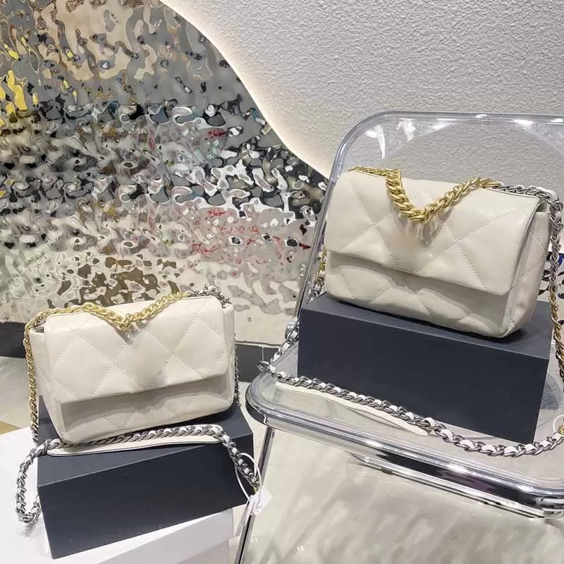 Femmes Mini FLAP Sac à bandoulière Haute Qualité Couleur Solid Cowhide Designer Bandbody Sacs Pache Tine Tine Chaînes de Tine Chaînes de poche Ha