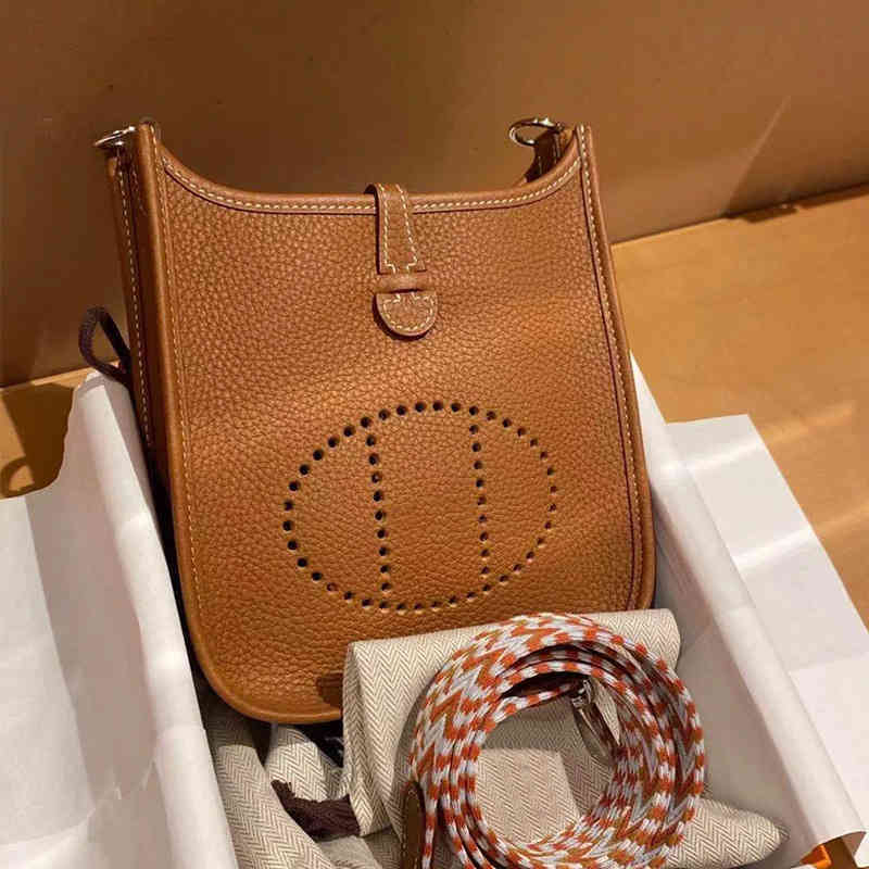Outlet new hollowed out bucket bag head layer cow leather Evelyn leather women's bag one shoulder cross mobile phone bag-image-771847019