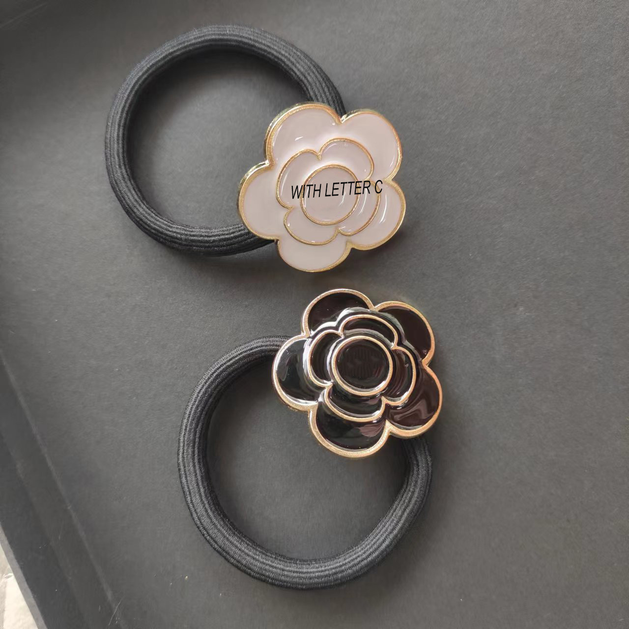 

fashion hair ties camellia C metal Black and white decoration hair rope bracelets accessories With paper card