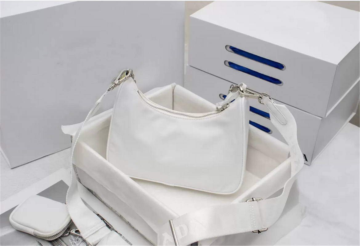 

2022 Designer Brands Hollow Letters Raffia Straw Tote Fashion Paper Woven Women Shoulder Bags Summer Beach Handbag Luxury Bag H0698