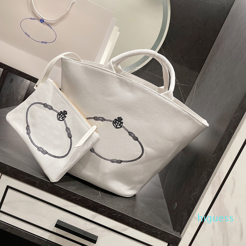 2022-Ladies shopping bags luxury designer products fashion portable mother and child bag retro classic high quality packaging
