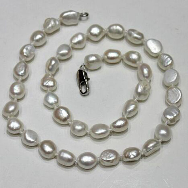 

Natural white baroque freshwater pearl necklace 8x9mm 18in