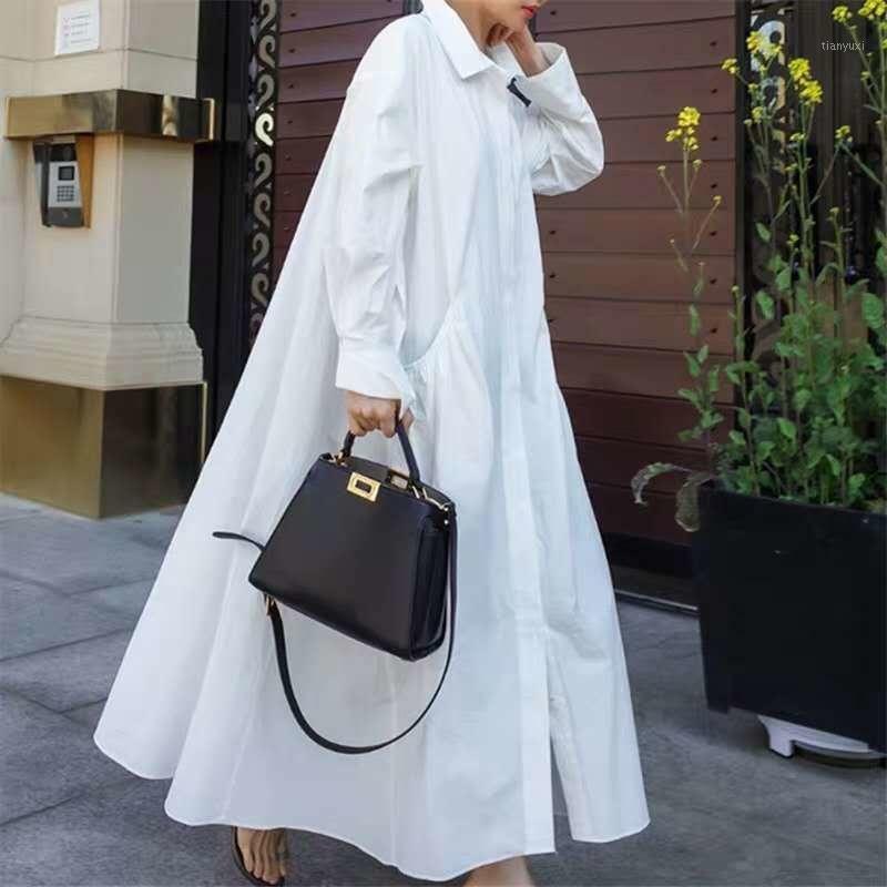 

Casual Dresses [EWQ] Korea Chic Loose Full Solid White Shirt Dress Fashion Autumn Cloak Turn Down Collar Women 2022