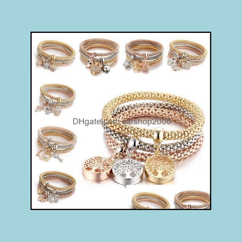 

Charm Bracelets Jewelry 3Pcs/Set Elastic Crystal Bracelet Diamond Heart Crown Tree Of Life Skl Butterfly Bangle Cuff Sets Epacket Drop Deliv
