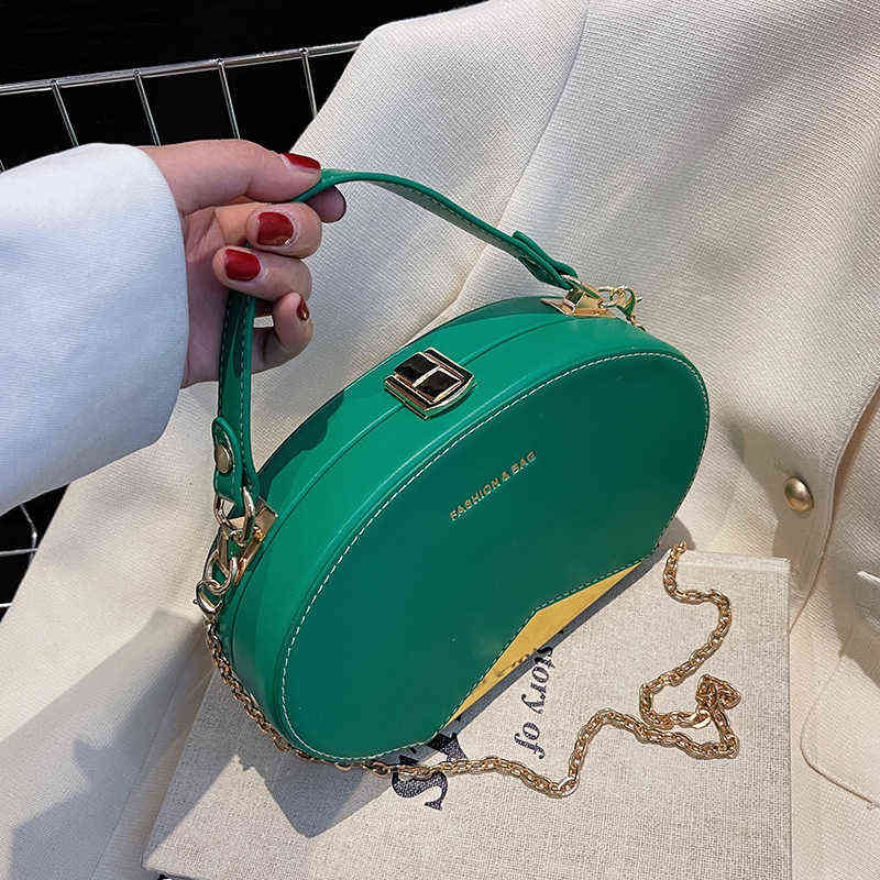 

2022 New Designer bags Women Oval Handbags Ladies Vintage Totes for Hard Handle Famous Small Crossbody Bags 220416, Pink