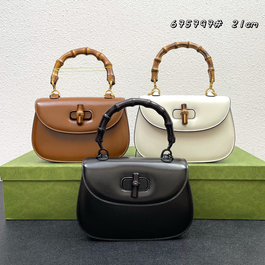 

High quality Handbag bamboo handle Crossbody Bag cowhide material Backpack Detachable webbing shoulder strap woman bag Dimensions 21x 15x 7cm., White