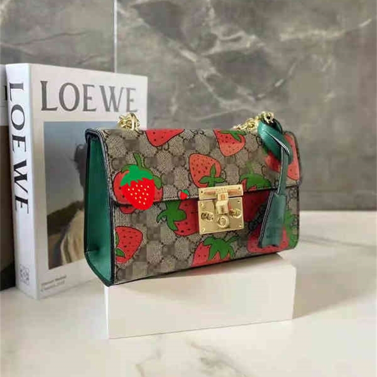 

62% OFF trendy bags 2022 New Designer Handbags High version Women's new strawberry Single Shoulder Fashion Hand women's lock chain, Red