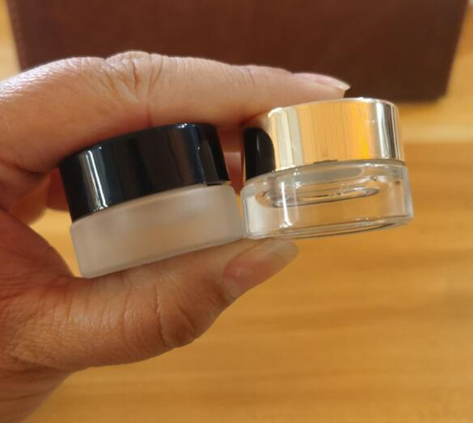 

mini small glass jar bottle 3g frosted clear thick round bottom black gold screw cap for cosmetic eye cream vape wax concetrate container stash custom print logo