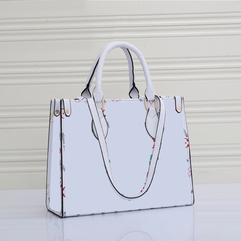 Concepteur de luxe Tote Cross Body Body Sac classiques monogrammes monogrammes Handle Handle Sac à main Femmes crossbody Pu Le cuir