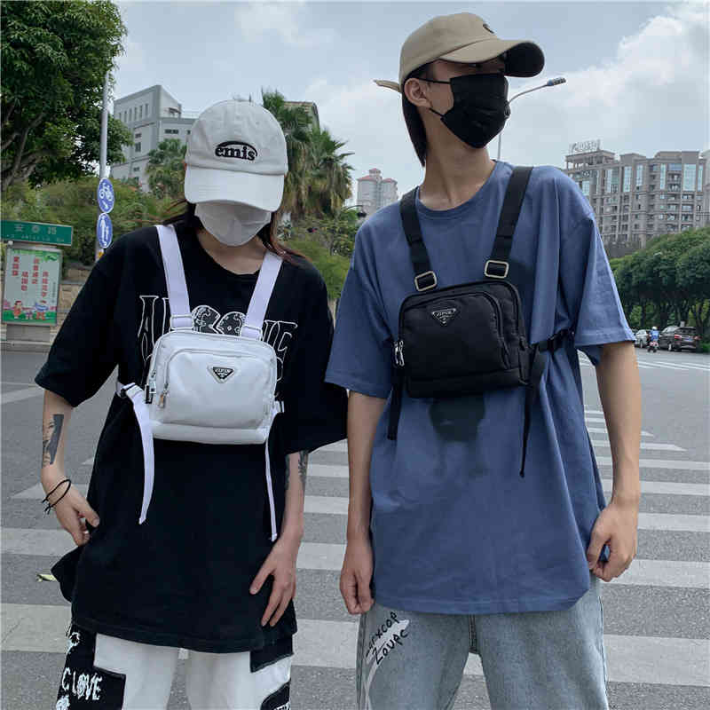 Sacs Vente Pourses d'été Nouveau Vest tactique Homme et Femmes Style fonctionnel Performance Hop-hop Performance Simple Couple de couleur Solide