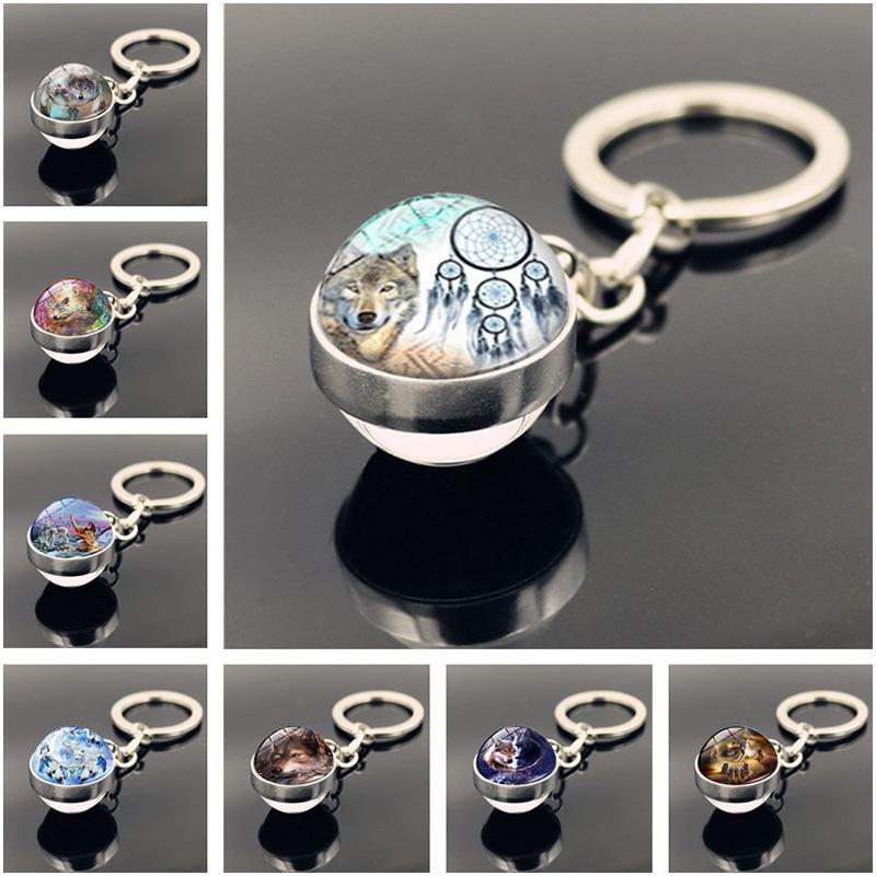 

Keychains Dreamcatcher Wolf Keychain Charms Jewelry With Silver Color Double Side Glass Ball Metal Car Ring Holder GiftKeychains