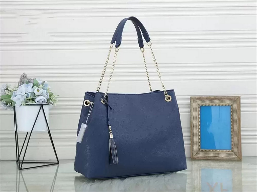 

2022 Designer Brands Hollow Letters Raffia Straw Tote Fashion Paper Woven Women Shoulder Bags Summer Beach Handbag Luxury Bag H0562