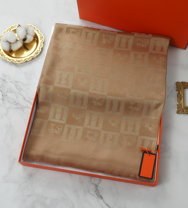 

Leisure business luxury autumn and winter silk wool scarf shawlsA long soft gold silk shawl by the designer for ladies