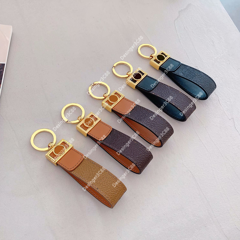 

Fashion Luxurys Designer Keychain Straps WITH BOX Leather High Quality Key Chain Buckle Pendant Accessories Key Ring Brand Designers Gifts Women Men Car Bag Charms