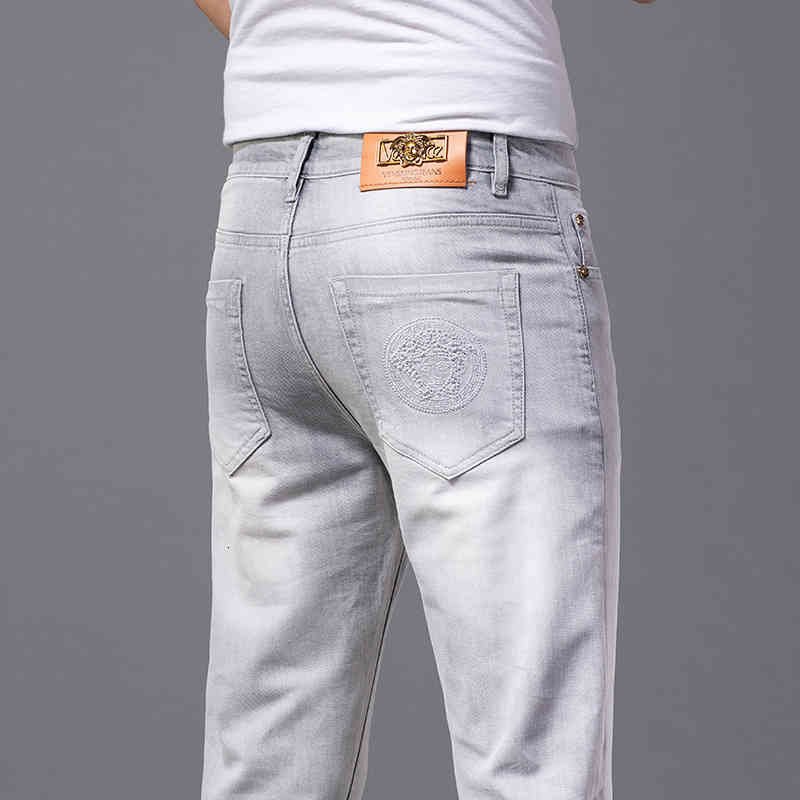 Men's Jeans Spring jeans men's Korean version small foot slim fit international high-end brand light luxury cotton bullet Medusa embroi