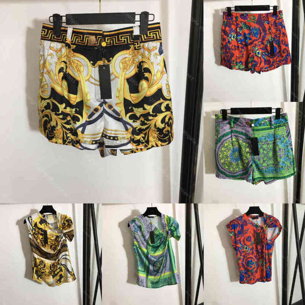 

22ss summer women silk short sleeve T-shirt shorts two piece suit letter logo metal knots irregular tee vest retro print sexy shorts skirt 5A quality female Apparel a1