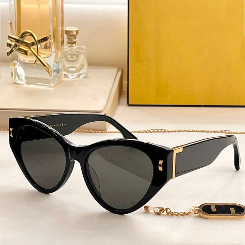 Womens sunglasses First cat-eye shaped glasses 1148FS classic acetate with gold-coloured metal rivets sun glasses maxi letter logo on the temples