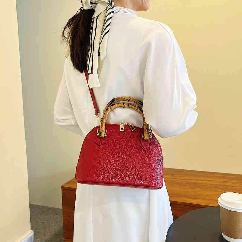 

Purses Outlet simple texture sling one shoulder women's bag design spring new personalized oblique cross shell bag, Red