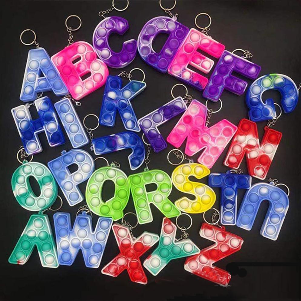 

Learning cognition 26 letters Poit Finger Keychain Decompression Toy Fidget Toys Pop Push Flip Fidget Toys257a