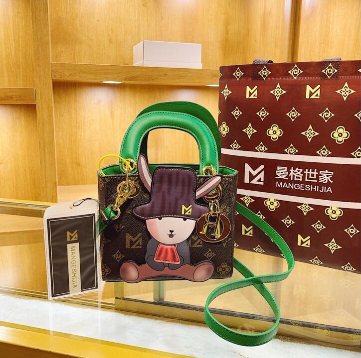 

Wholesale factory ladies leathers shoulder bags sweet cute cartoon fashion handbag street trend contrast color leather handbags summer foreign style printing bag, Coffee-5128