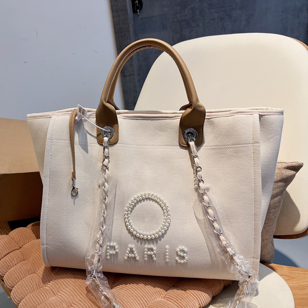 

22Ss Summer Famous Brand Tote Classic Beach Bags Canvas Deauville Chain Bag Top Quality Large Capacity Pochette Womens Pearl Shopping Bag LuxuryDesigner Handbags, Black