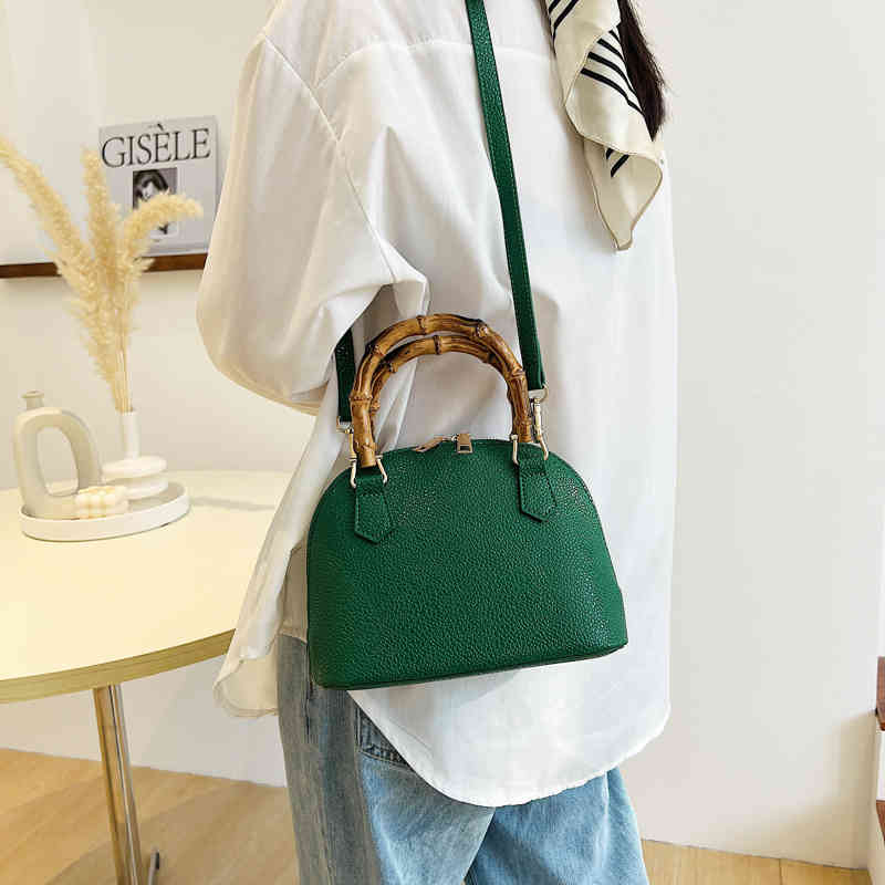 

Purses Outlet Minority design feeling style bamboo portable shell women's 2022 new summer messenger sling one shoulder bag, White