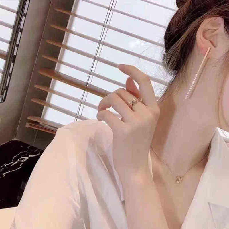 Fine new versatile red the temperament tassel with diamond earrings high version 925 silver needle earrings
