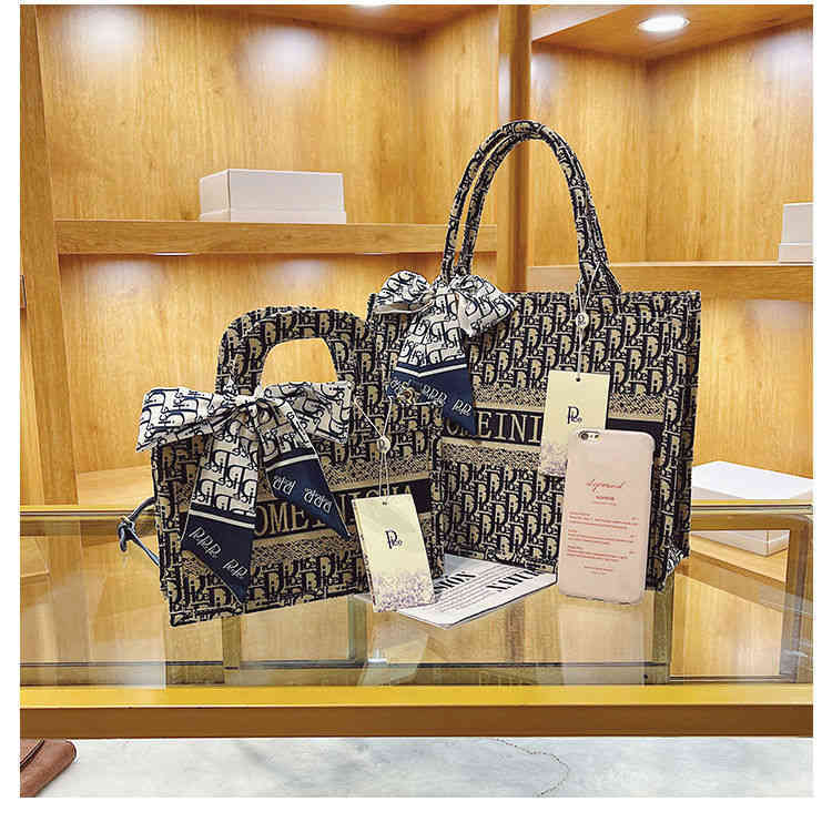 Crossbody designer Dchritians Bags Temperament 2022 Style Korean Version Letter Tote Bag Foreign Messenger Female Student Ins Shopping