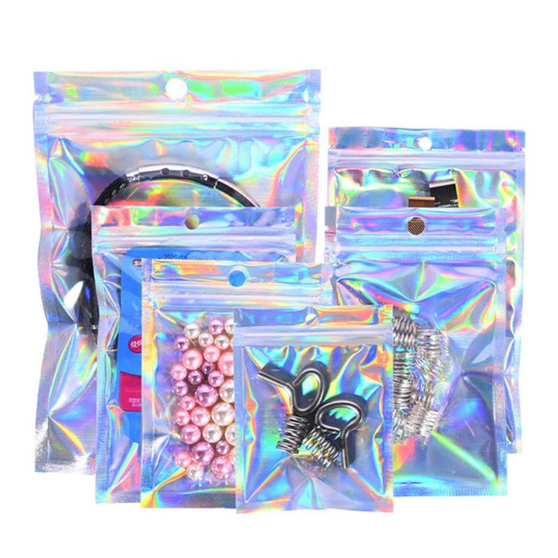 

Jewelry Pouches Bags 50pcs Iridescent Zip Lock Cosmetic Plastic Laser Zipper Retail Packaging Poly Ziplock BagsJewelry