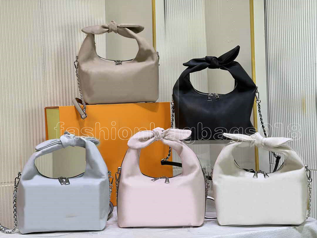 

WHY KNOT PM Shoulder Bag Mahina Perforated Monograms Calfskin Womens Handbag Designers Luxury Cross Body Clutch Bag M20700, Color 1