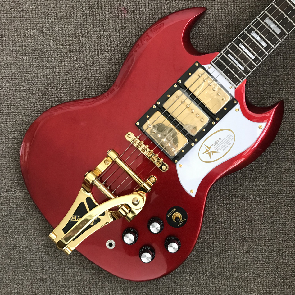 

SG electric guitar, rosewood fingerboard, gold hardware, vibrato system, metallic red, 3 pickups, solid mahogany body guitar