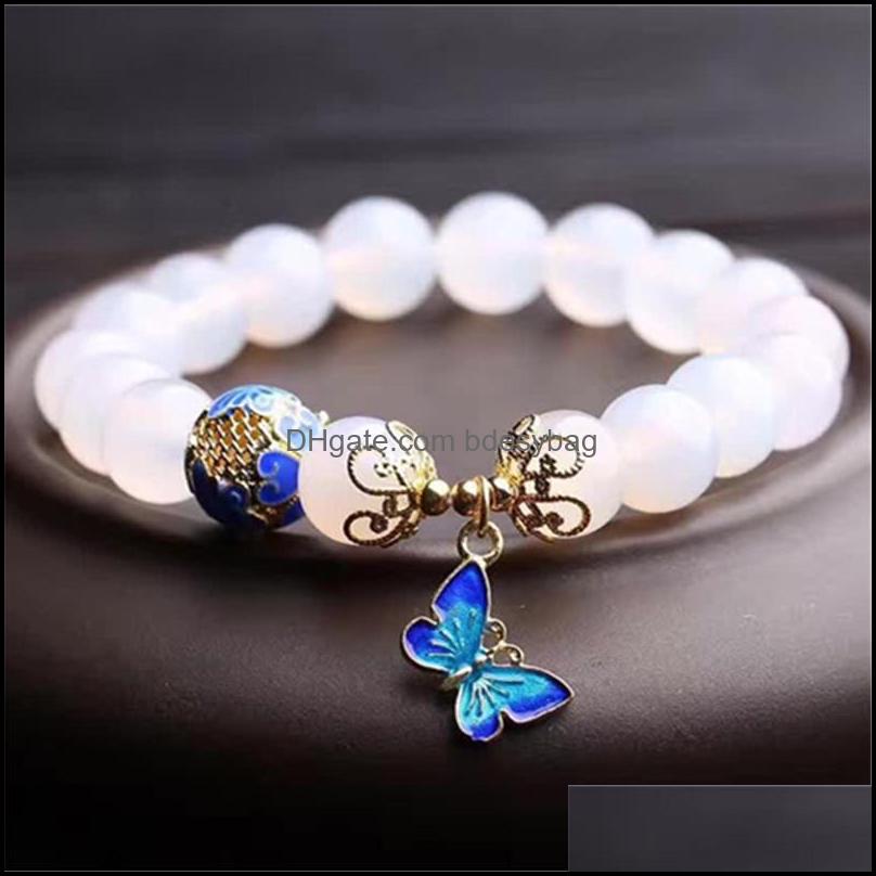 

Charm Bracelets High Quantity 10Mm Beads White Agates Natural Stone Bracelet Women Accessories Metal Butterfly Pendant Tasbih Bdesybag Dhns6