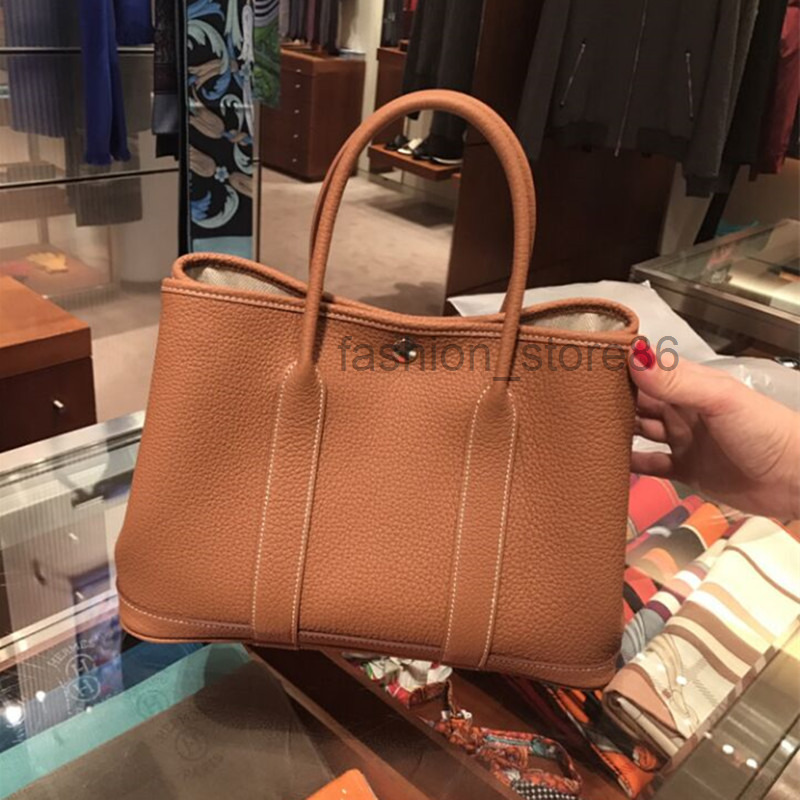 

designer cowhide women's bag single shoulder slant span simple garden portable large shopping bags Bucket Bag 2022 new