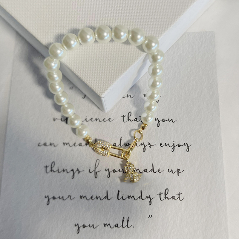 Western west Queen with the same wood star vivi pearl Bracelets European and American fashion Paper clip Saturn pearl bracelet 1 :1 brass plated cla