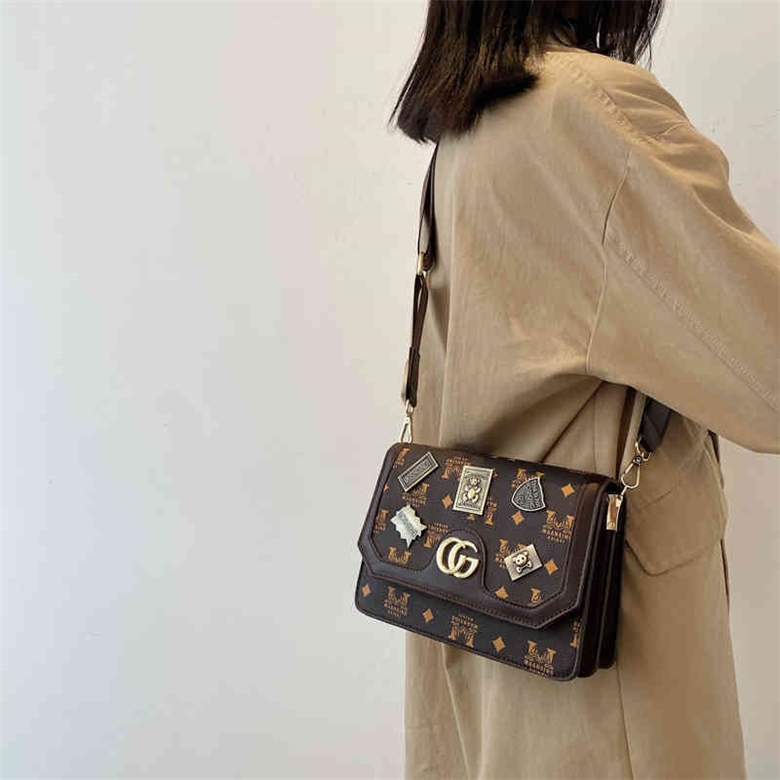 

66% OFF trendy bags 2022 New Designer Handbags trend small square cartoon single shoulder diagonal cross, Brown stripe