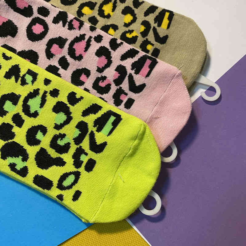 

Designer Runner Soccer Basketball Sport Sock Trendy Medium High Tube Cotton Street Stockings Mens And Womens Leopard Print Sports Basketball Skateboard Socks, Fluorescent green double