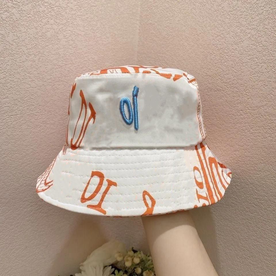 Descents chapeaux de seau Luxurys Wide Brim Chapeaux de couleur solide LETTRE DE COULEUR SUNHATS SULHATS MASSE TRAND