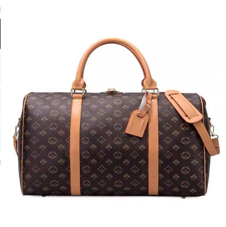 

Top Quality New Men Duffle Bag Women Travel Hand Luggage Bags Pu Leather Handbags Large CrossBody Bags Totes 55cm, St2