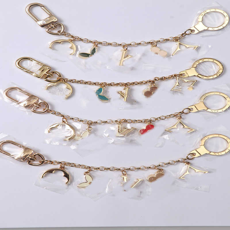 

Designer Keychains Fashion Bags Car Key Chain Flowers Design Accessories Men Women Decoration Jewelry 138