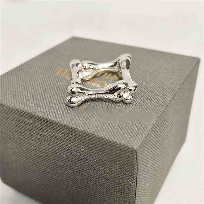 

Western Empress Dowager Vivienne West Wood Classic Bone Punk Hip Hop Rock Artificial Spot