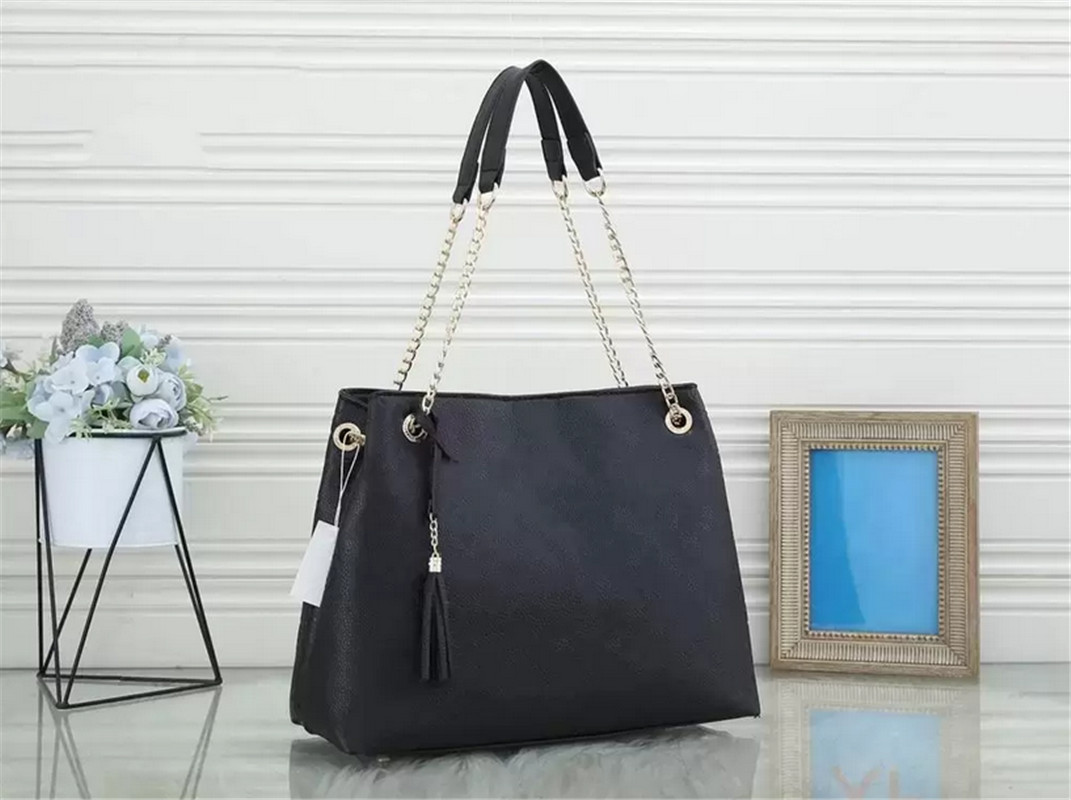 

2022 Designer Brands Hollow Letters Raffia Straw Tote Fashion Paper Woven Women Shoulder Bags Summer Beach Handbag Luxury Bag H0560